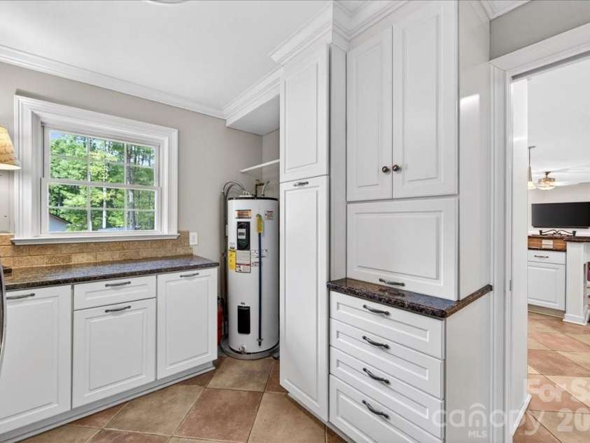 3229 Zelda Lane, Matthews, NC 28105.  MLS# CAR4366492, YatesRealty ID 12580. Laundry Room 