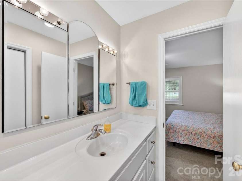 3229 Zelda Lane, Matthews, NC 28105.  MLS# CAR4366492, YatesRealty ID 12580. Primary Bathroom