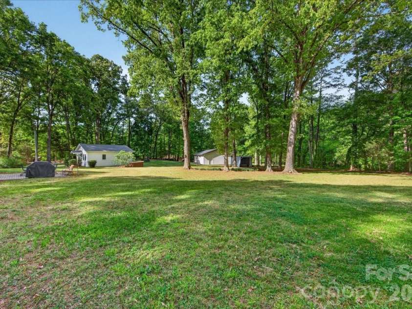 3229 Zelda Lane, Matthews, NC 28105.  MLS# CAR4366492, YatesRealty ID 12580. Rear yard 