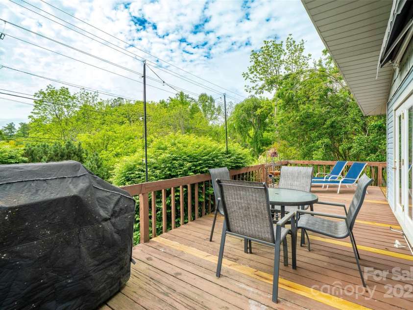 381 Old Mars Hill Highway, Weaverville, NC 28787.  MLS# CAR4255110, YatesRealty ID 12585. Plenty of room for grilling and outdoor dining