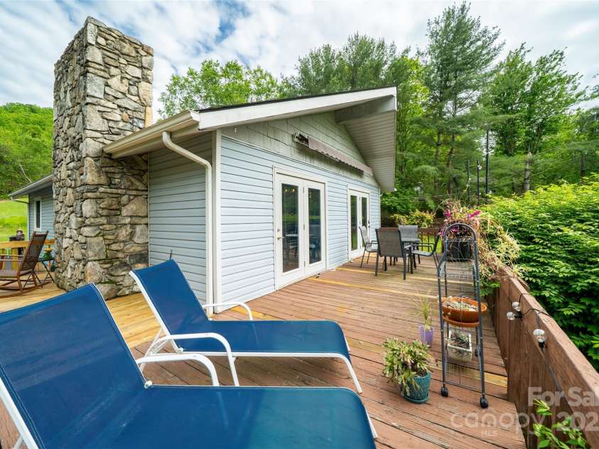 381 Old Mars Hill Highway, Weaverville, NC 28787.  MLS# CAR4255110, YatesRealty ID 12585. Wrap Around Deck