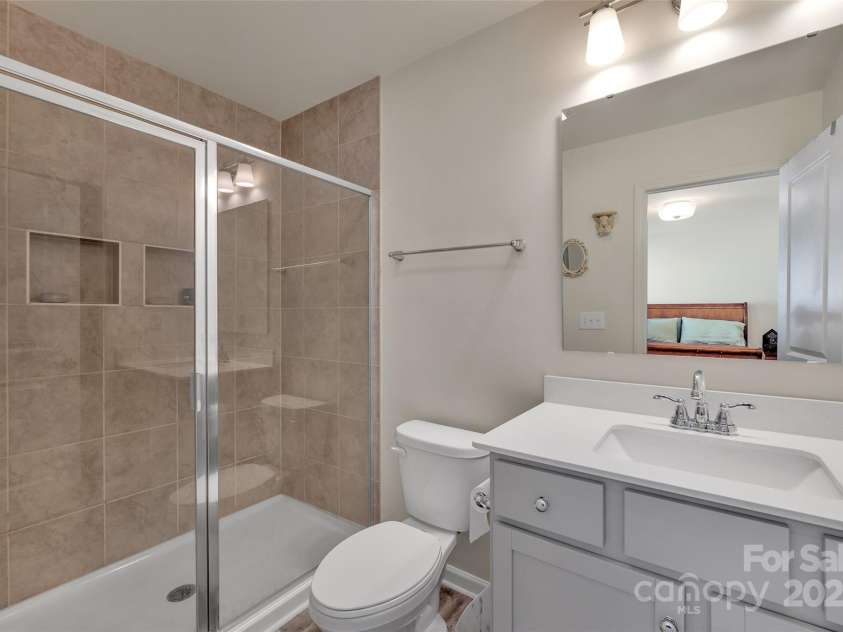 11017 Woodland Creek Way, Charlotte, NC 28262.  MLS# CAR4231820, YatesRealty ID 12586. Primary Bedroom Bathroom