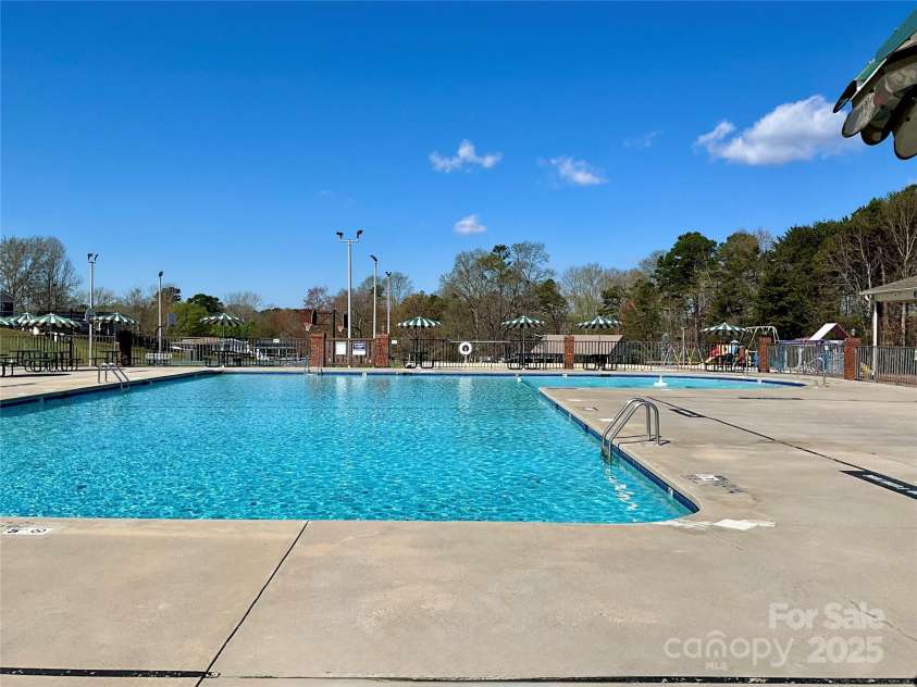 222 Badin View Road, New London, NC 28127.  MLS# CAR4239141, YatesRealty ID 12588. Commuity Pool