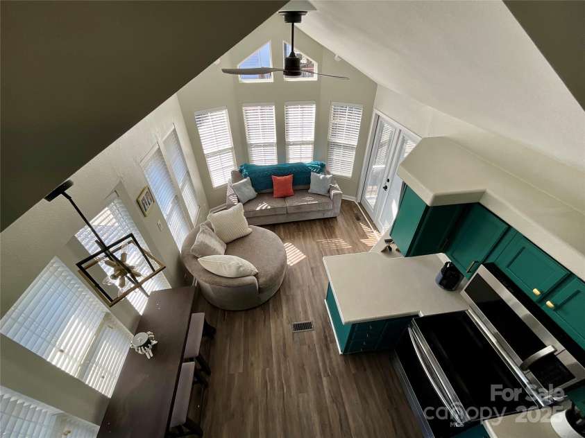 222 Badin View Road, New London, NC 28127.  MLS# CAR4239141, YatesRealty ID 12588. View of living area from loft