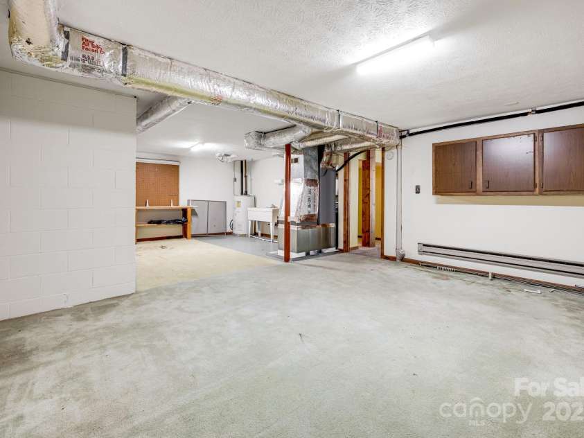 411 Britton Creek Drive, Hendersonville, NC 28791.  MLS# CAR4244943, YatesRealty ID 1259. 