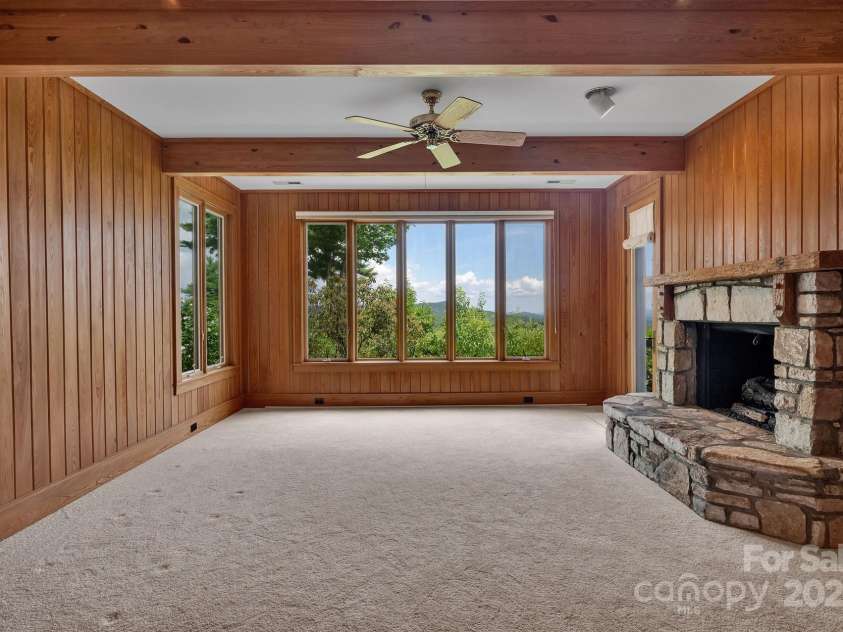 721 Lakeside Drive, Lake Toxaway, NC 28747.  MLS# CAR4240541, YatesRealty ID 1259. Downstairs family room