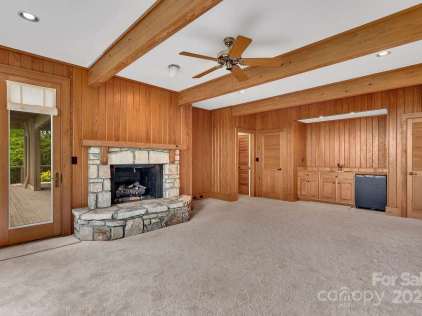 721 Lakeside Drive, Lake Toxaway, NC 28747.  MLS# CAR4240541, YatesRealty ID 1259. Downstairs family room