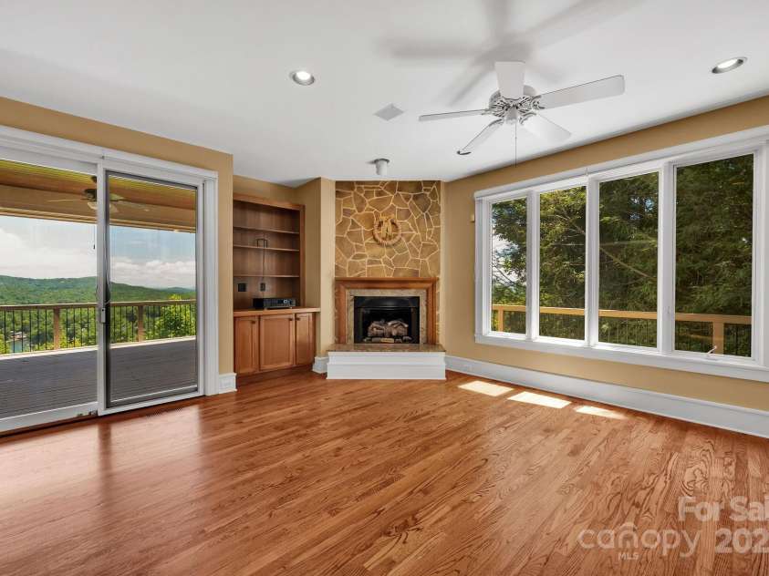721 Lakeside Drive, Lake Toxaway, NC 28747.  MLS# CAR4240541, YatesRealty ID 1259. Family room off kitchen
