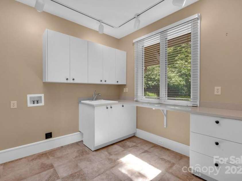 721 Lakeside Drive, Lake Toxaway, NC 28747.  MLS# CAR4240541, YatesRealty ID 1259. Laundry room 2