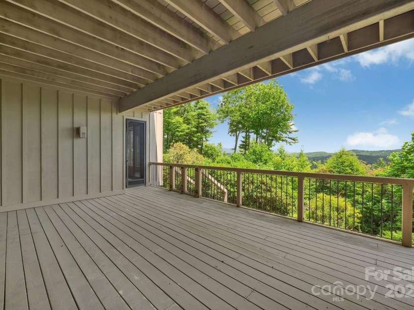 721 Lakeside Drive, Lake Toxaway, NC 28747.  MLS# CAR4240541, YatesRealty ID 1259. Lower deck 
