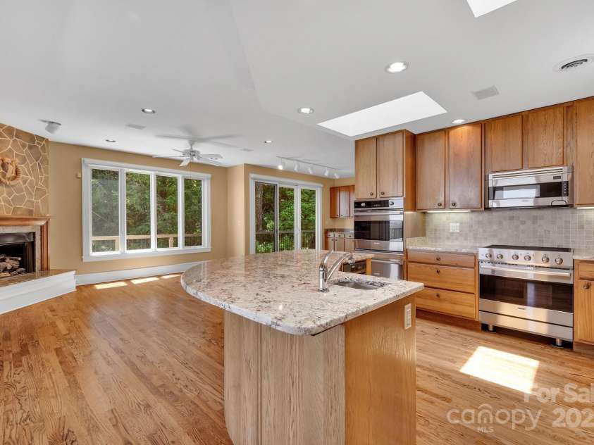 721 Lakeside Drive, Lake Toxaway, NC 28747.  MLS# CAR4240541, YatesRealty ID 1259. Open kitchen 