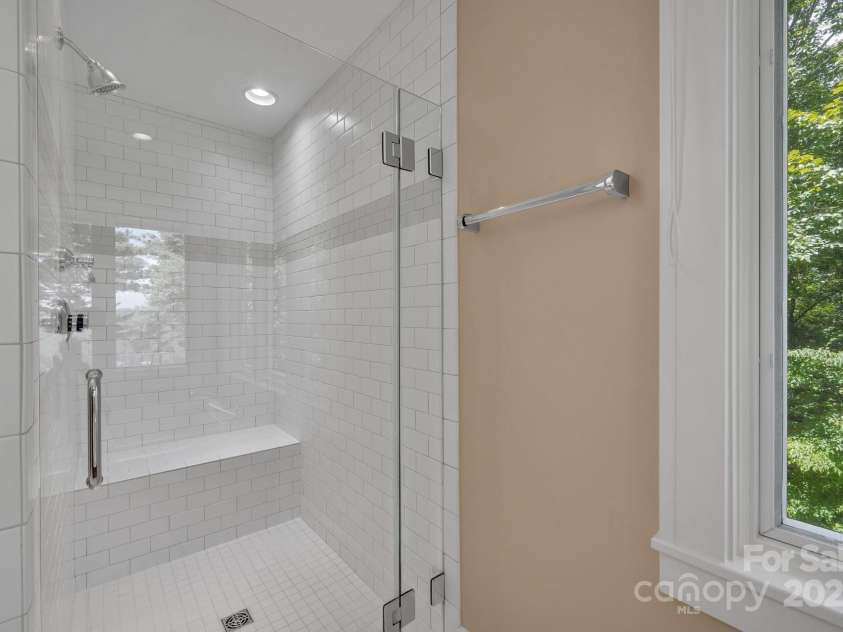 721 Lakeside Drive, Lake Toxaway, NC 28747.  MLS# CAR4240541, YatesRealty ID 1259. Primary bath shower