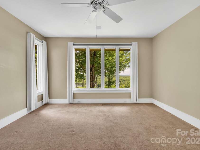 721 Lakeside Drive, Lake Toxaway, NC 28747.  MLS# CAR4240541, YatesRealty ID 1259. Primary Bedroom