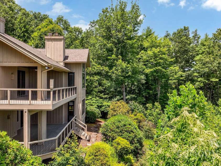 721 Lakeside Drive, Lake Toxaway, NC 28747.  MLS# CAR4240541, YatesRealty ID 1259. Right corner of home