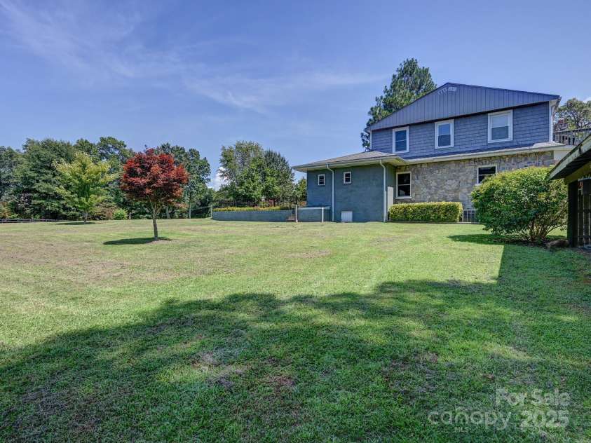 1771 Drexel Road, Valdese, NC 28690.  MLS# CAR4171321, YatesRealty ID 12591. Back yard