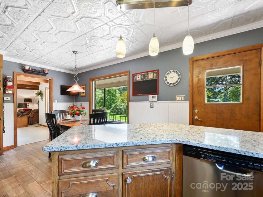 1771 Drexel Road, Valdese, NC 28690.  MLS# CAR4171321, YatesRealty ID 12591. Kitchen looking into Formal Living Area