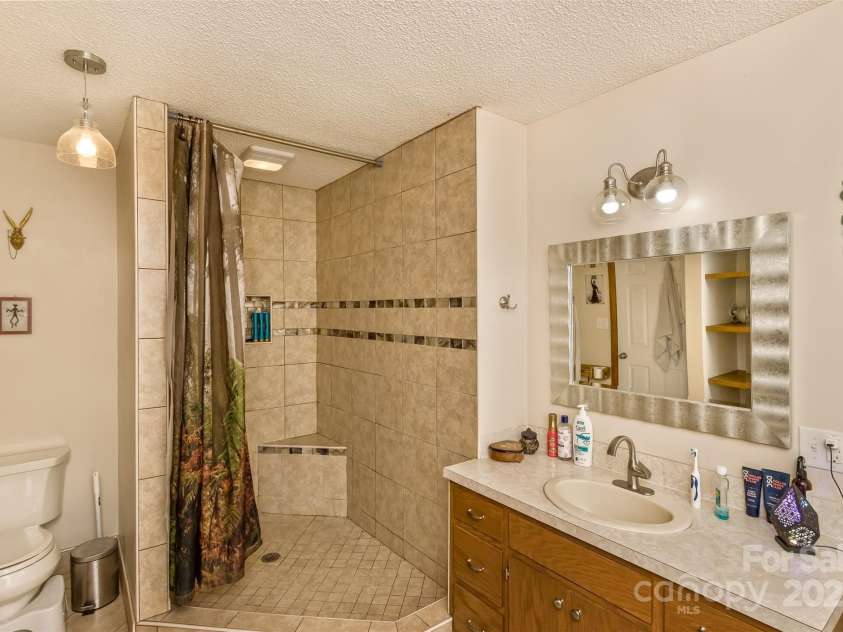 117 White Pine Lane, Morganton, NC 28655.  MLS# CAR4246633, YatesRealty ID 12597. Also features an updated walk-in shower.