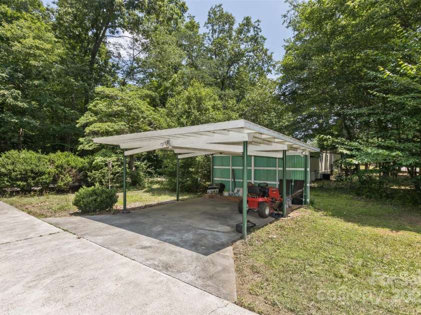 117 White Pine Lane, Morganton, NC 28655.  MLS# CAR4246633, YatesRealty ID 12597. Detached carport is conveniently located off the driveway.