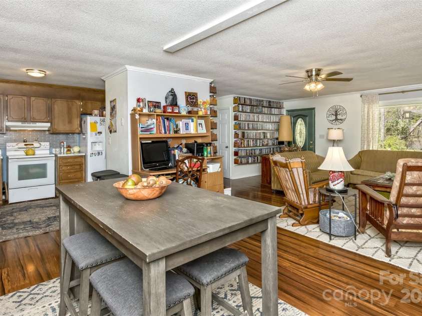 117 White Pine Lane, Morganton, NC 28655.  MLS# CAR4246633, YatesRealty ID 12597. Dining room grants easy access to the kitchen and living room.