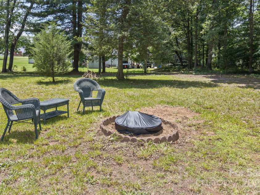 117 White Pine Lane, Morganton, NC 28655.  MLS# CAR4246633, YatesRealty ID 12597. Fun at the fire pit!
