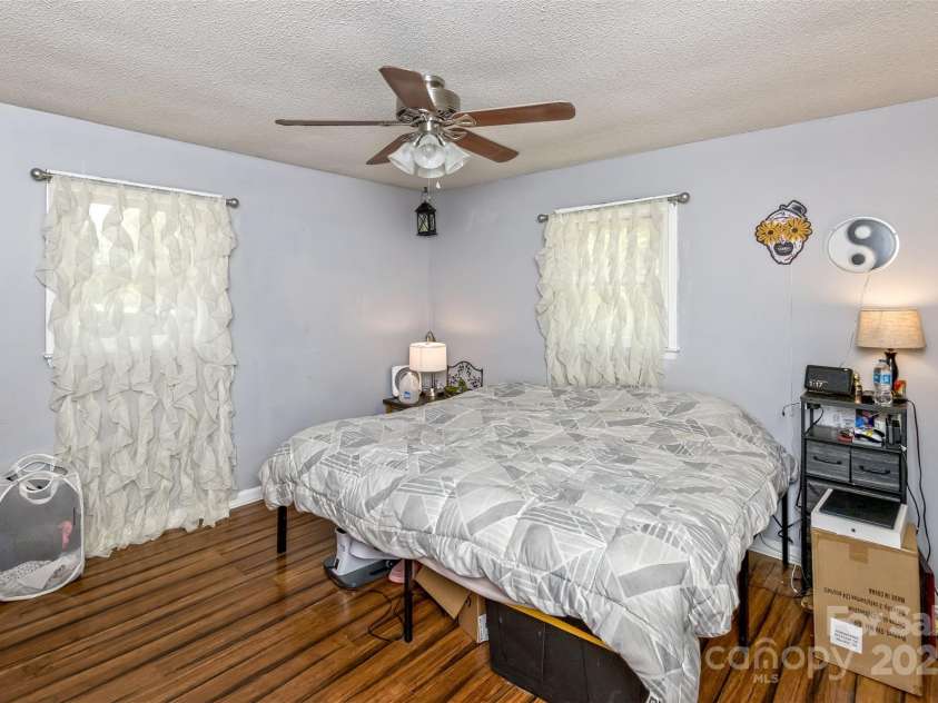 117 White Pine Lane, Morganton, NC 28655.  MLS# CAR4246633, YatesRealty ID 12597. Primary bedroom is spacious and welcoming.