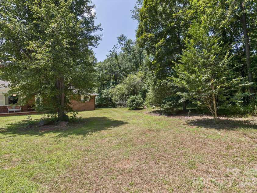 117 White Pine Lane, Morganton, NC 28655.  MLS# CAR4246633, YatesRealty ID 12597. Spacious and mature back yard.