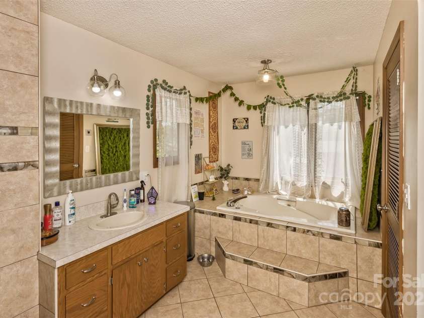 117 White Pine Lane, Morganton, NC 28655.  MLS# CAR4246633, YatesRealty ID 12597. Spacious en suite primary bath!