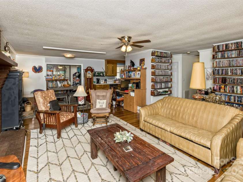 117 White Pine Lane, Morganton, NC 28655.  MLS# CAR4246633, YatesRealty ID 12597. Spacious living room with lots of natural light.