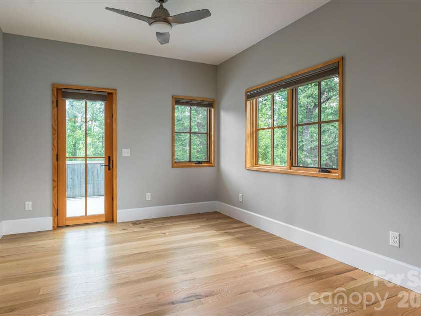 7 Bee Balm Way, Asheville, NC 28804.  MLS# CAR4290500, YatesRealty ID 12598. Bedroom to second level deck