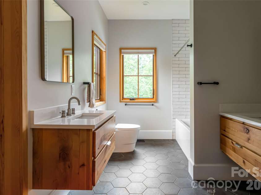 7 Bee Balm Way, Asheville, NC 28804.  MLS# CAR4290500, YatesRealty ID 12598. Guest bath on second level
