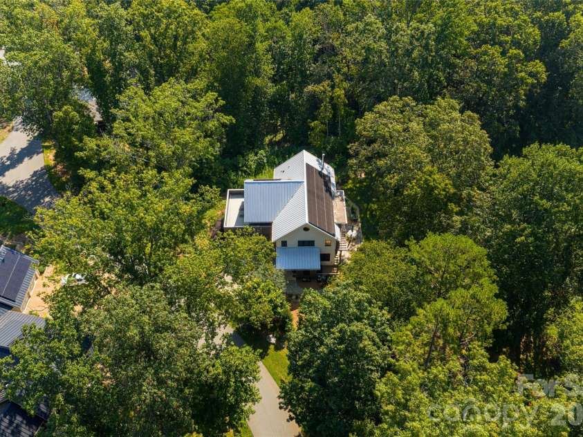 7 Bee Balm Way, Asheville, NC 28804.  MLS# CAR4290500, YatesRealty ID 12598. Privacy created by lush greenery