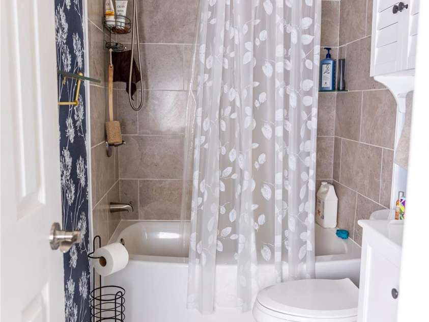 57 Gribble Road, Franklin, NC 28734.  MLS# CAR4253647, YatesRealty ID 126. Full bathroom on the left with heated floor