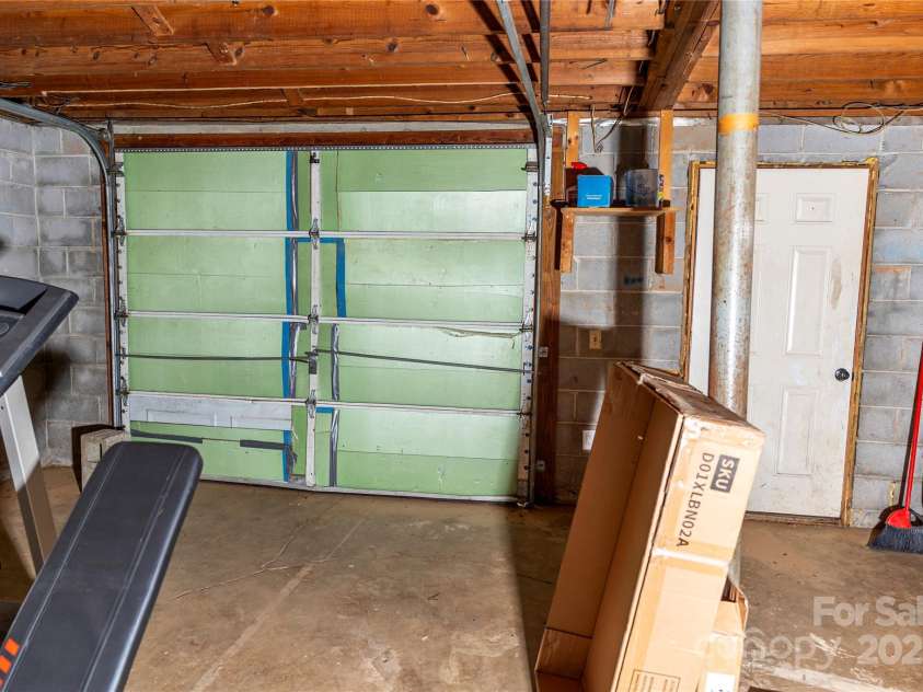 57 Gribble Road, Franklin, NC 28734.  MLS# CAR4253647, YatesRealty ID 126. Garage Door with space for single car