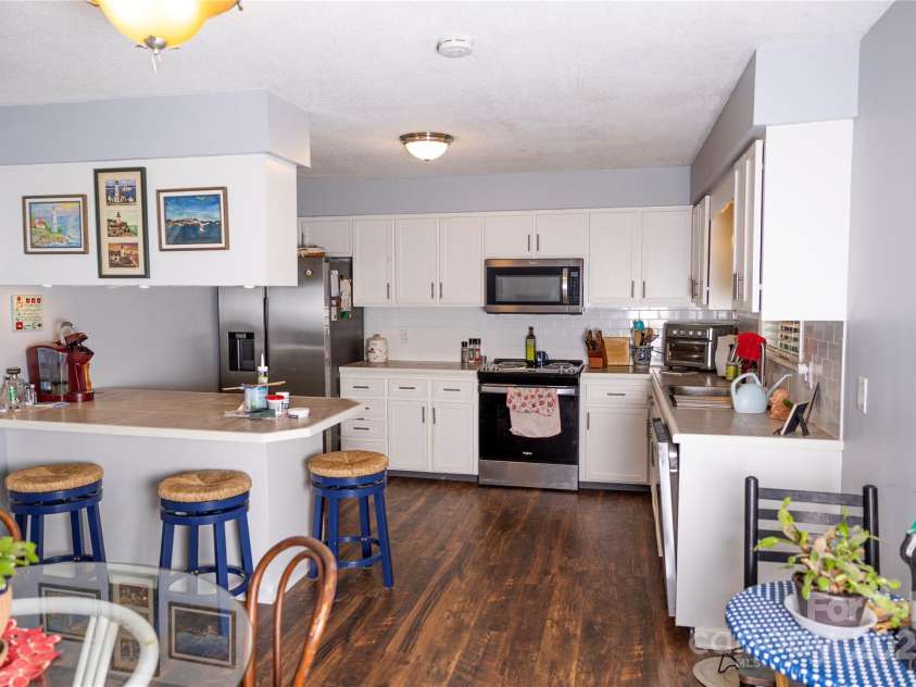 57 Gribble Road, Franklin, NC 28734.  MLS# CAR4253647, YatesRealty ID 126. Large kitchen and Dining area