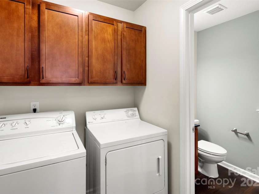 134 Alpine Ridge Drive, Asheville, NC 28803.  MLS# CAR4244493, YatesRealty ID 12600. Laundry and Half Bath right off Kitchen