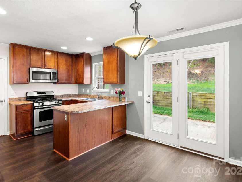 134 Alpine Ridge Drive, Asheville, NC 28803.  MLS# CAR4244493, YatesRealty ID 12600. Plenty of sunlight throughout!