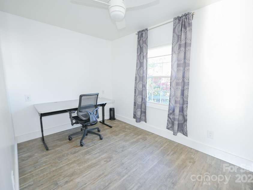 185 Elizabeth Avenue, Forest City, NC 28043.  MLS# CAR4253837, YatesRealty ID 12604. Office off of garage