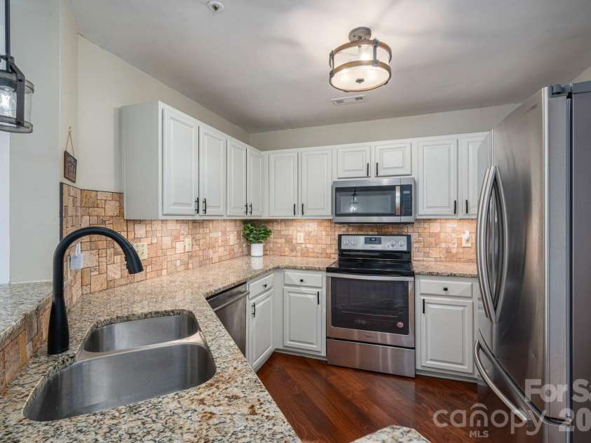 1018 Southwest Drive, Davidson, NC 28036.  MLS# CAR4352350, YatesRealty ID 12607. 