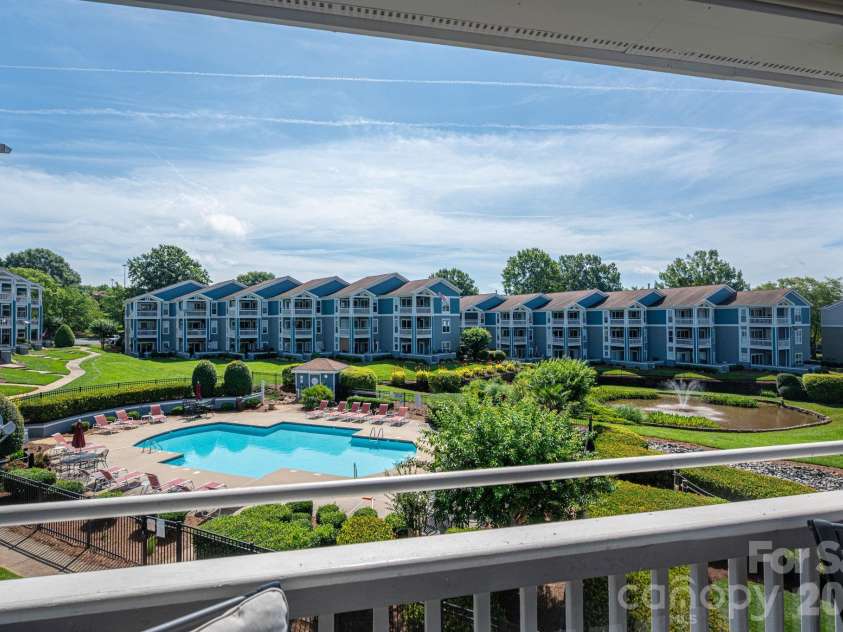1018 Southwest Drive, Davidson, NC 28036.  MLS# CAR4352350, YatesRealty ID 12607. Pool view from balcony