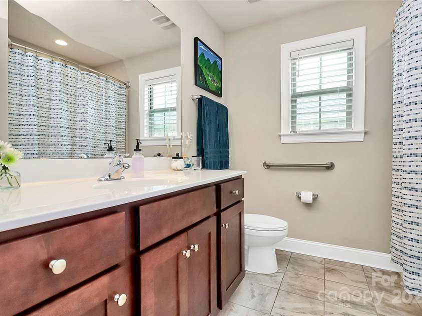 5315 Sustar Drive, Monroe, NC 28110.  MLS# CAR4231812, YatesRealty ID 12609. Hall Bathroom with Linen Closet