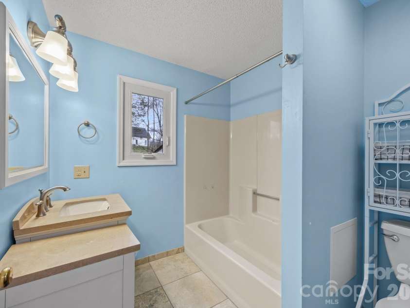 234 Justice Ridge Road, Candler, NC 28715.  MLS# CAR4359838, YatesRealty ID 12614. 