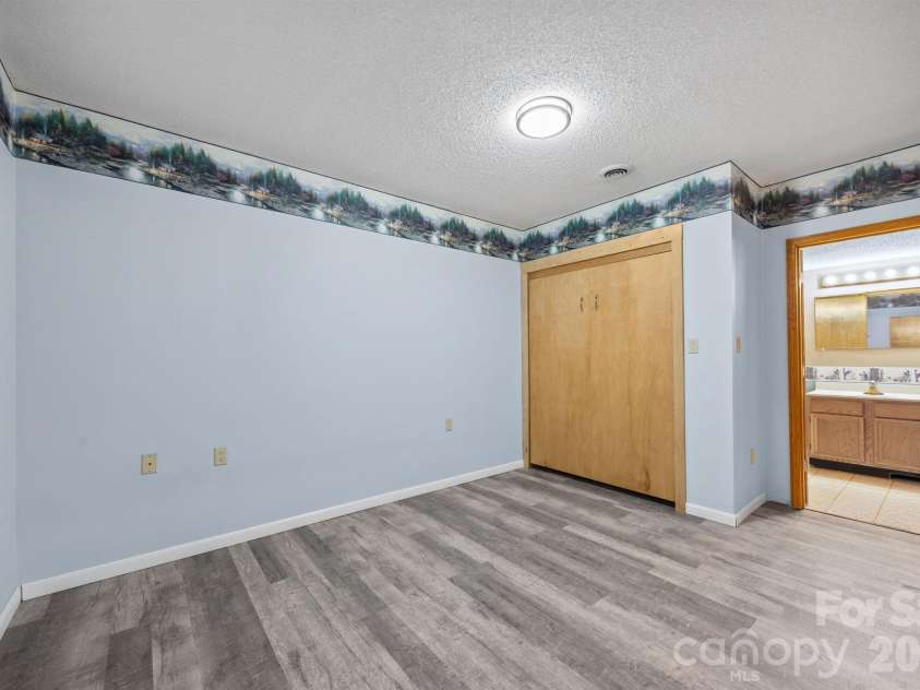 234 Justice Ridge Road, Candler, NC 28715.  MLS# CAR4359838, YatesRealty ID 12614. 