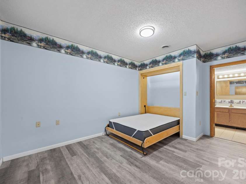 234 Justice Ridge Road, Candler, NC 28715.  MLS# CAR4359838, YatesRealty ID 12614. 