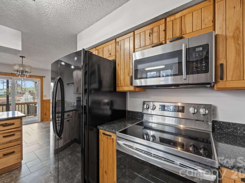 234 Justice Ridge Road, Candler, NC 28715.  MLS# CAR4359838, YatesRealty ID 12614. Kitchen
