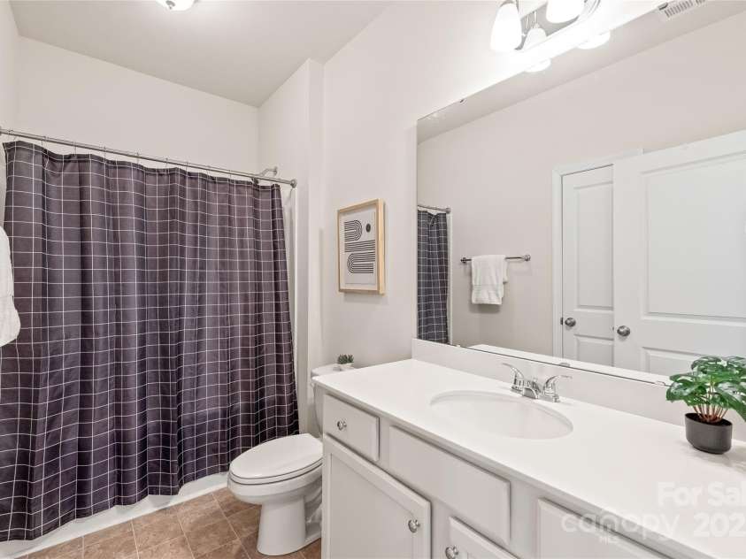 8500 Union Central Court, Waxhaw, NC 28173.  MLS# CAR4220758, YatesRealty ID 12622. Carpeted stairs lead you upstairs to the giant bonus room, offering endless possibilities for a home office, media room, or extra living space!