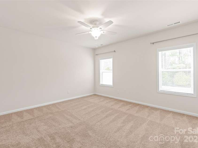 8500 Union Central Court, Waxhaw, NC 28173.  MLS# CAR4220758, YatesRealty ID 12622. Virtually staged primary bedroom