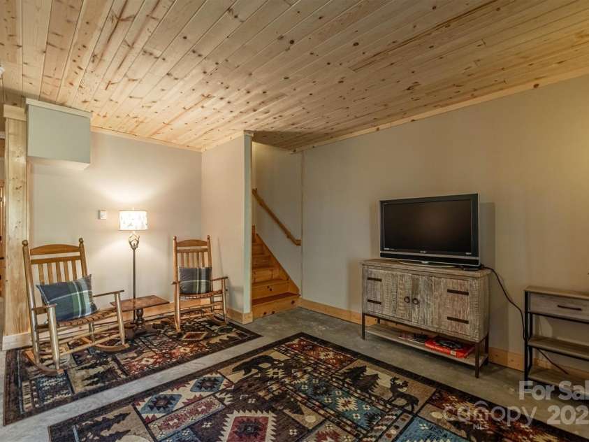 1143 Grandview Peaks Drive, Nebo, NC 28761.  MLS# CAR4329247, YatesRealty ID 1263. Basement Den