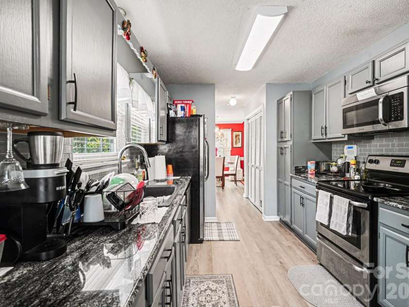 5813 Amity Springs Drive, Charlotte, NC 28212.  MLS# CAR4368141, YatesRealty ID 12632. 
