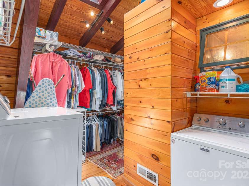 806 Twin Brook Drive, Waynesville, NC 28785.  MLS# CAR4254355, YatesRealty ID 12634. Washer/dryer located in main bedroom just outside walk in closet