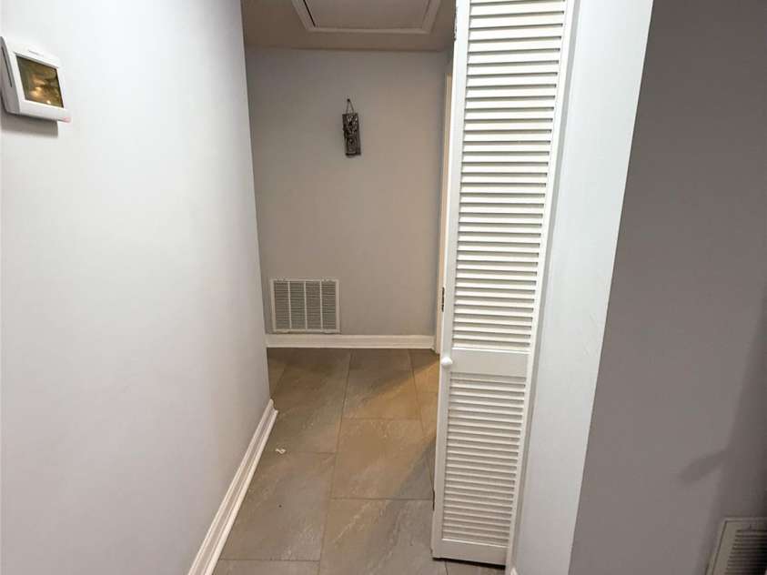 511 Eastwood Drive, Albemarle, NC 28001.  MLS# CAR4258873, YatesRealty ID 12640. Hallway leading to Bedroom 2 & 3